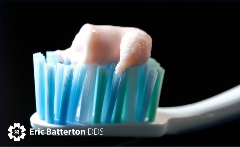 A toothbrush with toothpaste close up